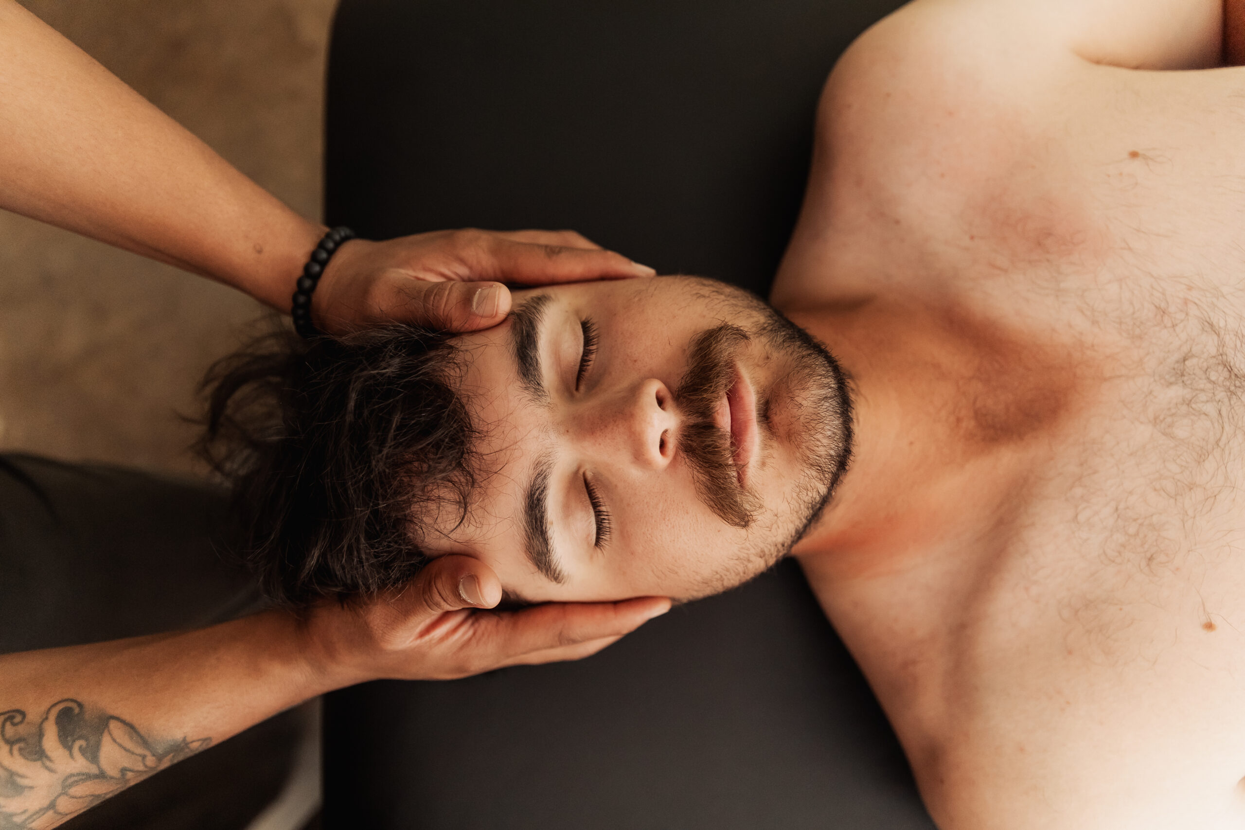 CranioSacral Therapy session for headaches with Certified Rolfer Kian Amir McGraw in Greenwood Village Colorado